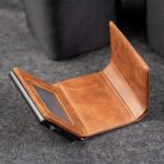 Kaarditasku Elevated Plus 2.15 Copper Brown avatuna: läbipaistev dokumenditasku ja sularahasahtel