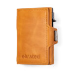 Kaarditasku Elevated Snap 1.0 Pastel Yellow valgel taustal